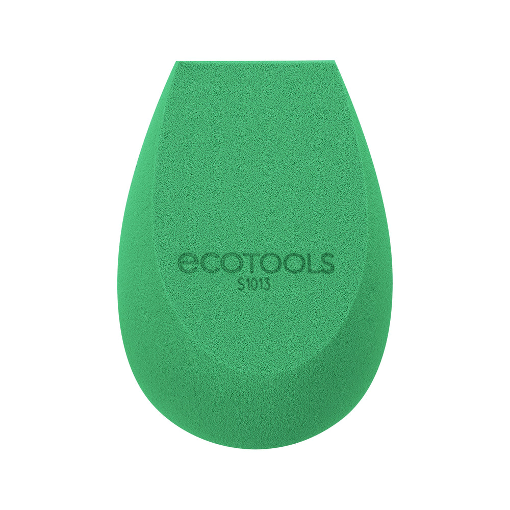 Close-up of green teardrop makeup sponge with Ecotools logo on the surface.