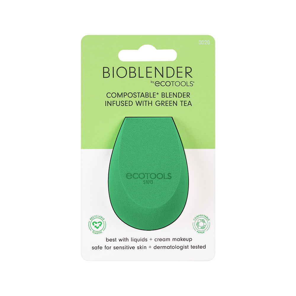 Close-up of green teardrop makeup sponge with Ecotools logo on the surface.