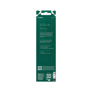 Blending face brush back packaging card in green with brush shown at top
