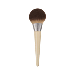 Powder blurring brush with rounded dark brown bristles and light bamboo handle