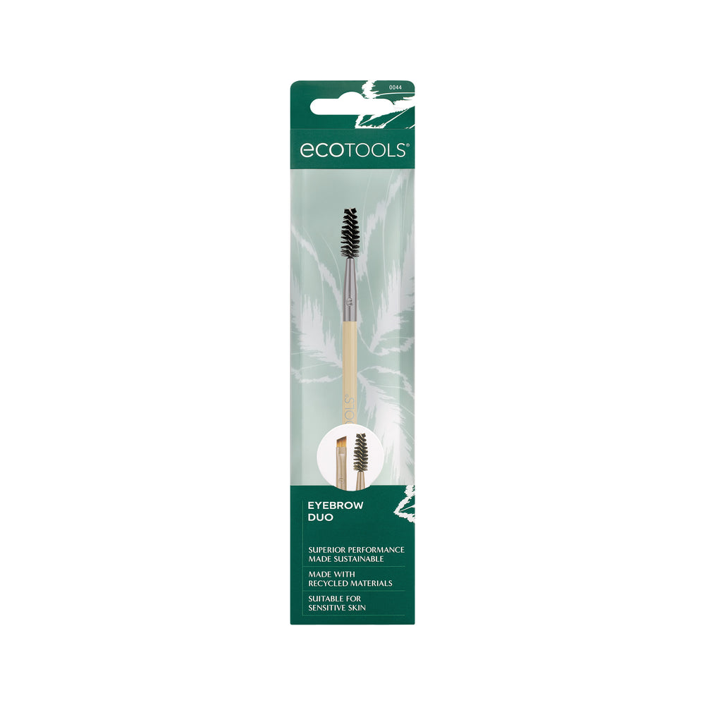 Eyebrow duo brush with angled bristle tip and black spoolie on beige handle