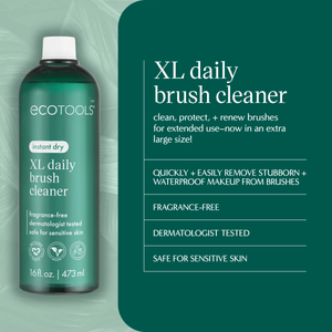 Green XL daily brush cleaner bottle with front label on a teal graphic.