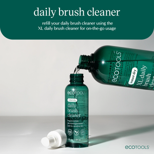 XL daily brush cleaner bottle and smaller refill bottle with white cap.