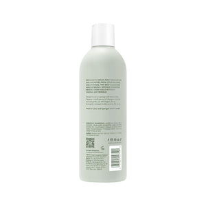 Sage-green makeup tool shampoo bottle with white cap, back label and barcode