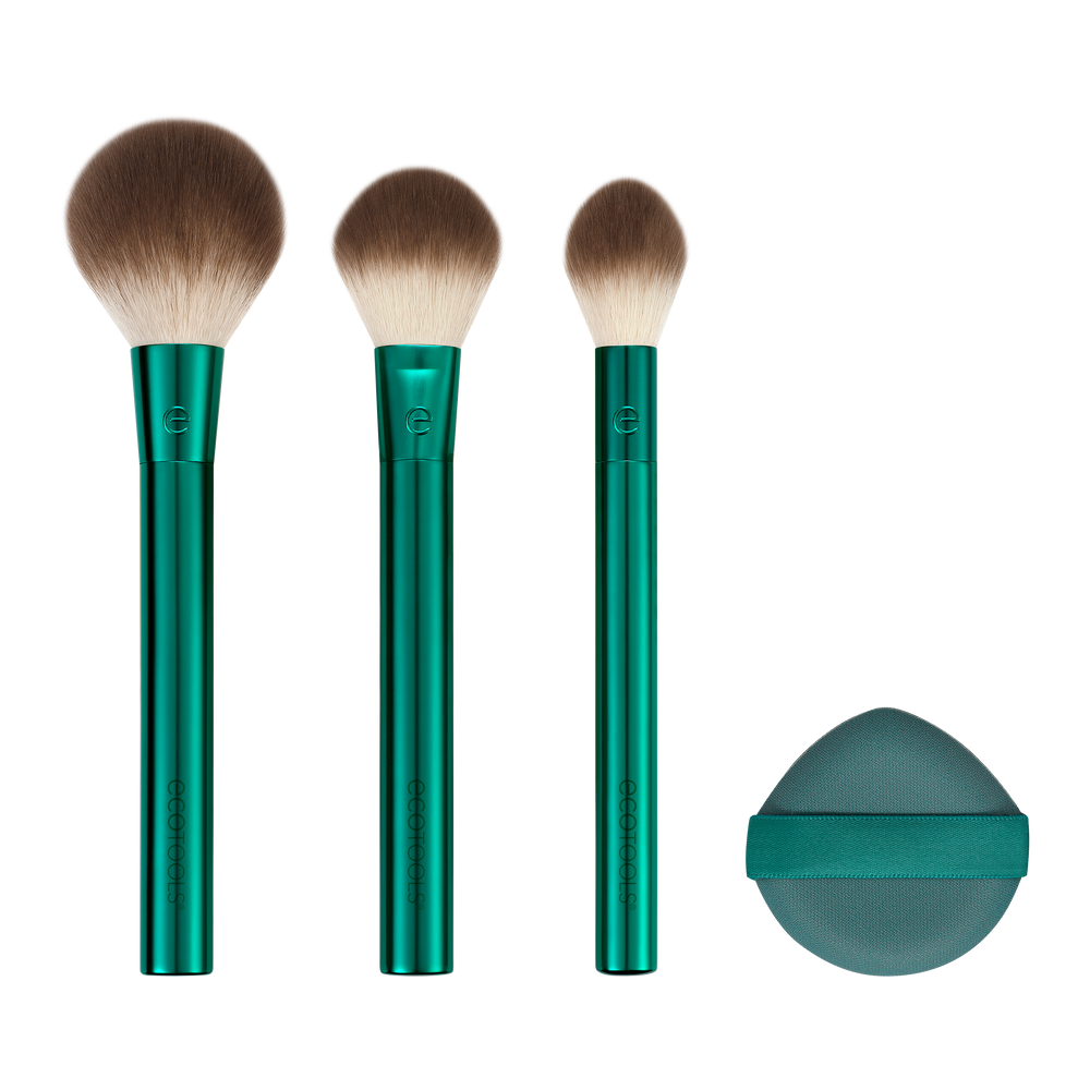 Green makeup brush set with three soft brown bristles and pointed tips