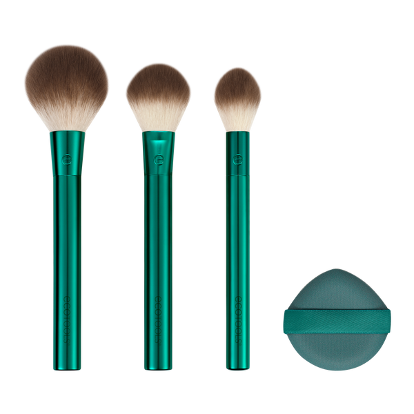 Green makeup brush set with three soft brown bristles and pointed tips