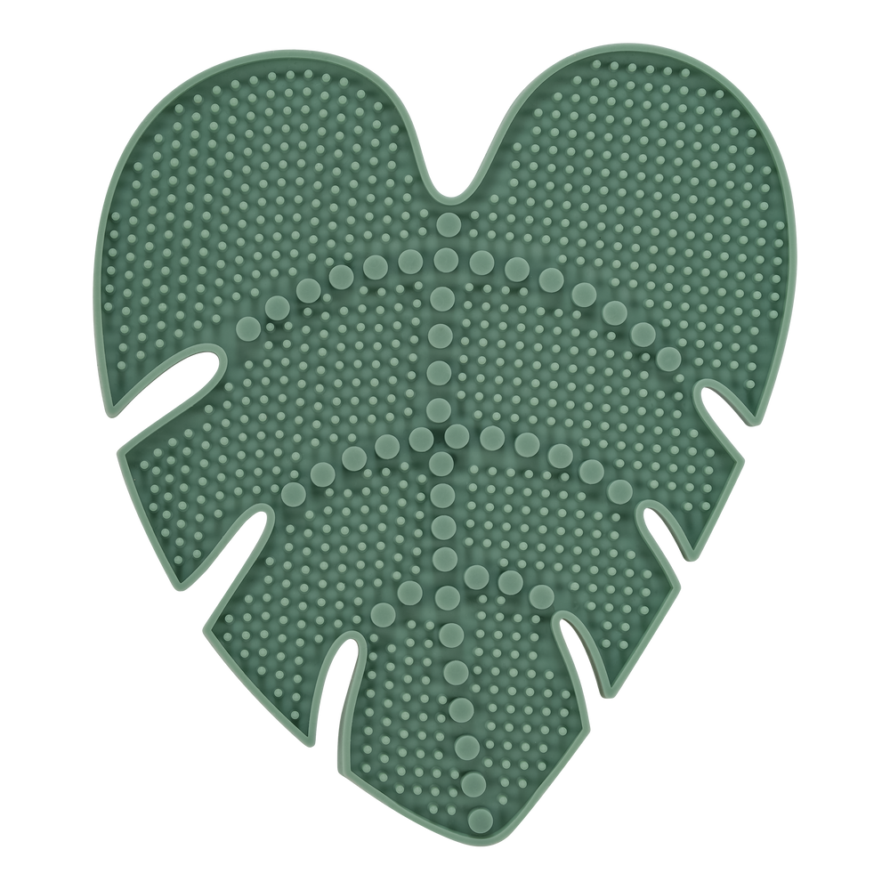 Leaf-shaped green silicone makeup brush cleansing pad with dense cleaning dots
