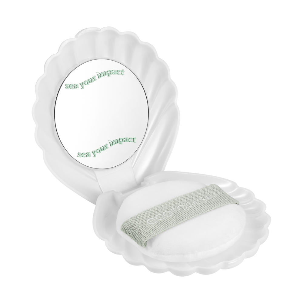 Shell-shaped makeup puff case with white pearl puff, mint band, and round mirror insert