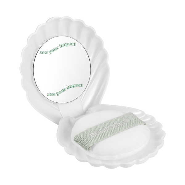Shell-shaped makeup puff case with white pearl puff, mint band, and round mirror insert