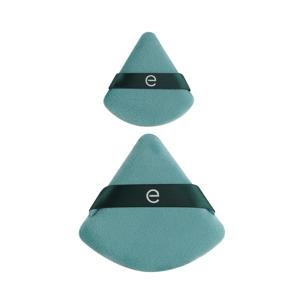 Two teal triangular powder puffs with dark green bands