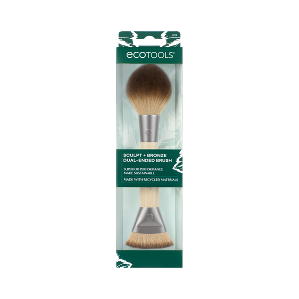 Dual-ended makeup brush retail box showing gray-beige handle and bronze bristles