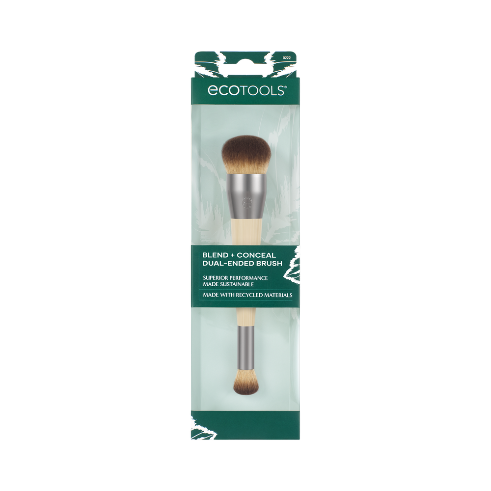 Makeup brush with rounded top brown bristles, silver ferrule, and beige handle