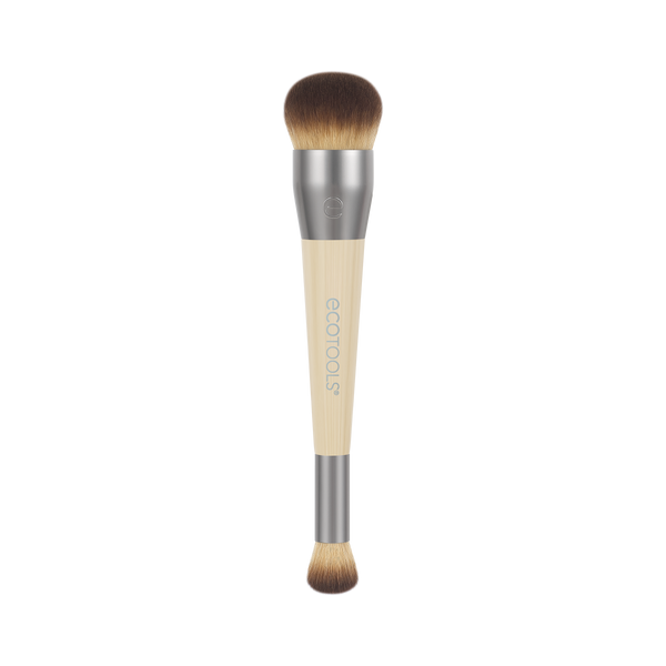 Makeup brush with rounded top brown bristles, silver ferrule, and beige handle