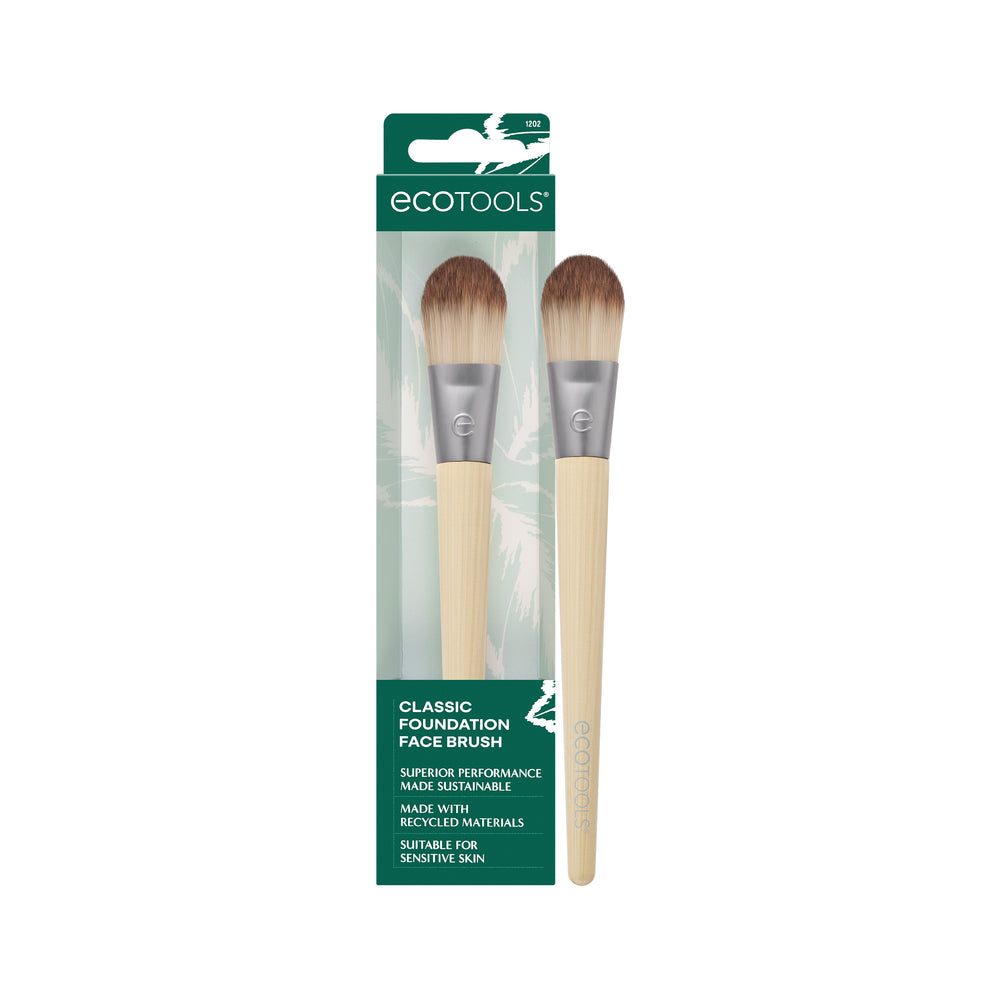 Foundation makeup brush with dark bristles and light bamboo handle