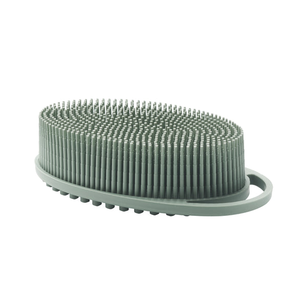 Sage green silicone body scrubber with bristle-textured surface and curved grip base