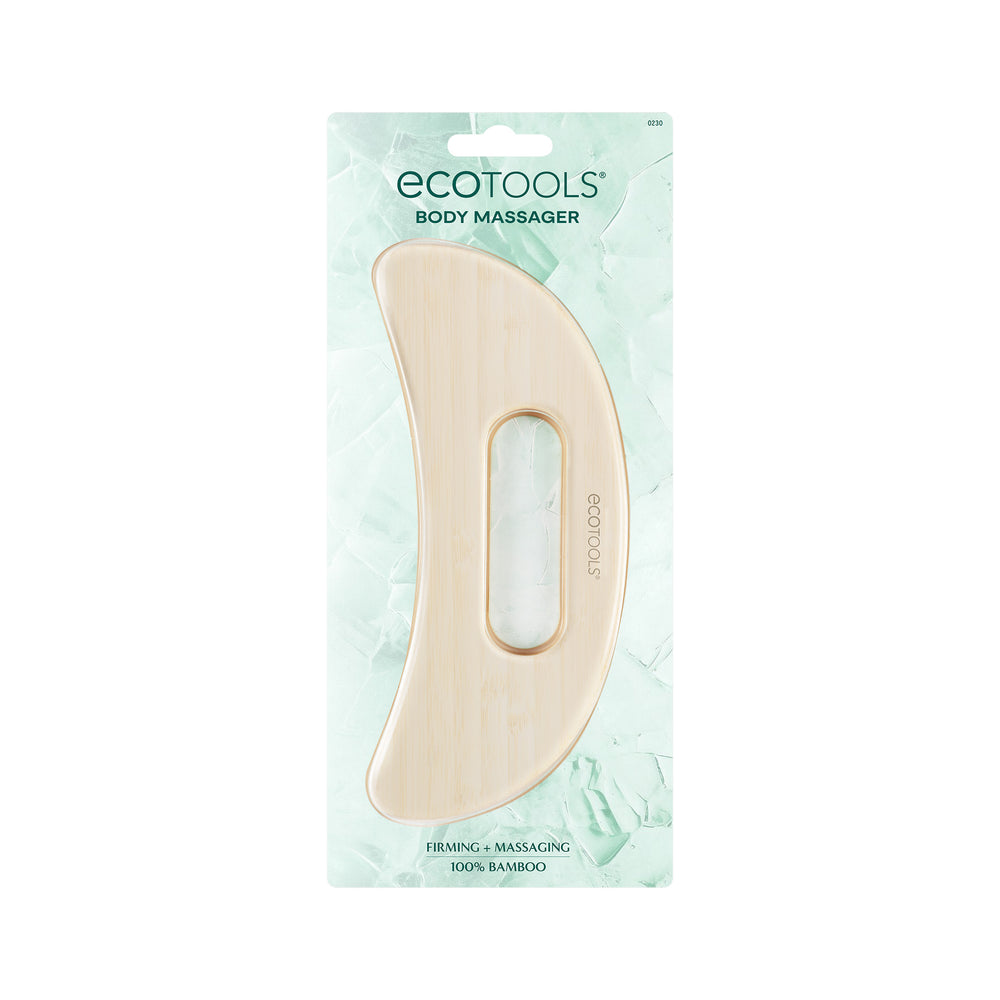 Light wood bamboo body massager with oval hand grip and cutout