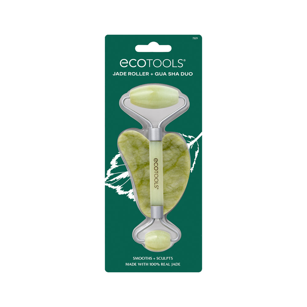 Jade-green facial roller with stainless steel handles and a gua sha stone