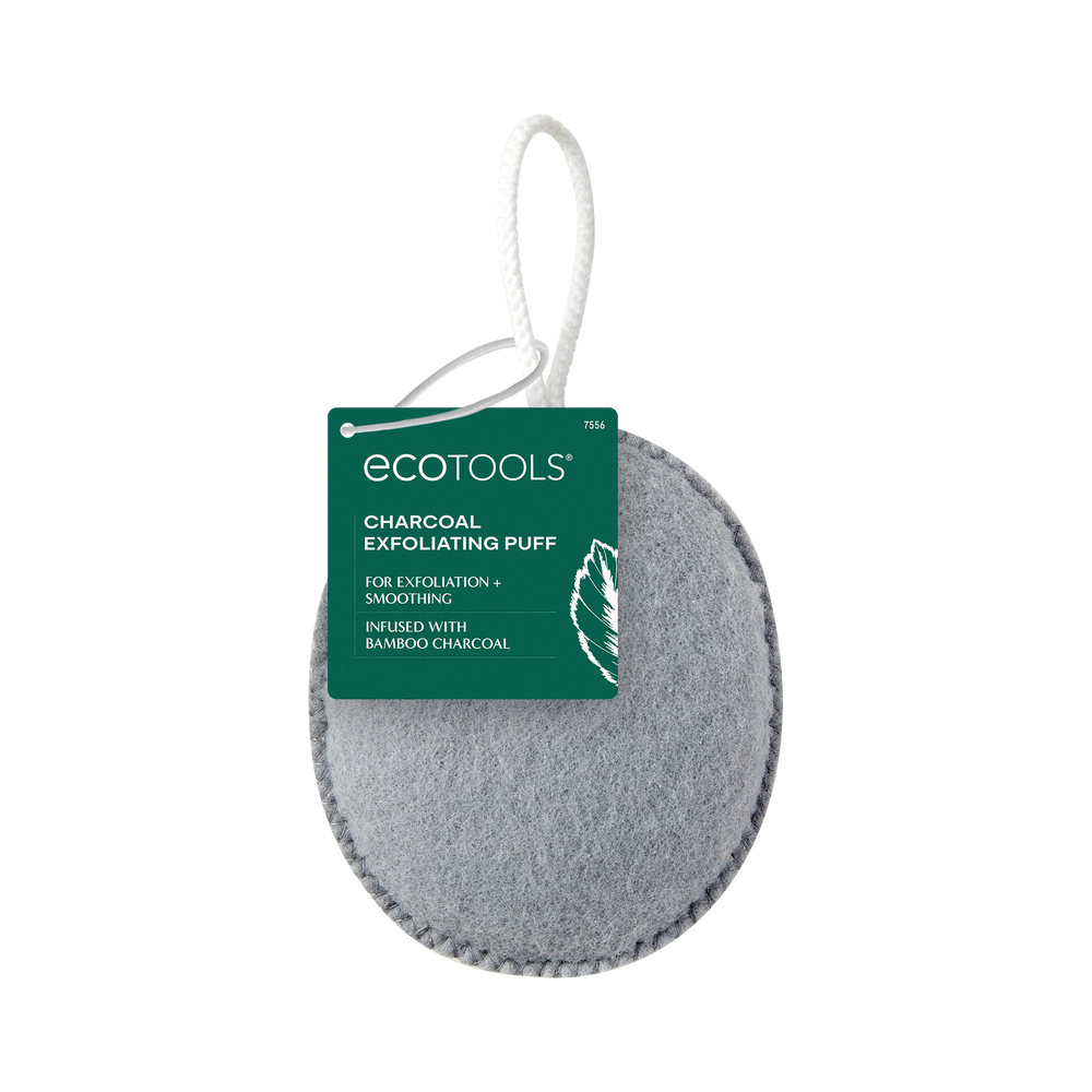 Grey oval exfoliating puff with hanging cord, textured scrubbing surface