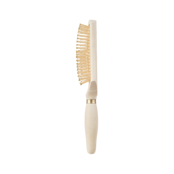 Rectangular detangling hair brush with light wood handle and cushion-style bristle pad