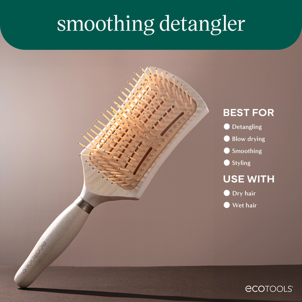 Smoothing detangler hair brush with cushioned pin head and light wood handle