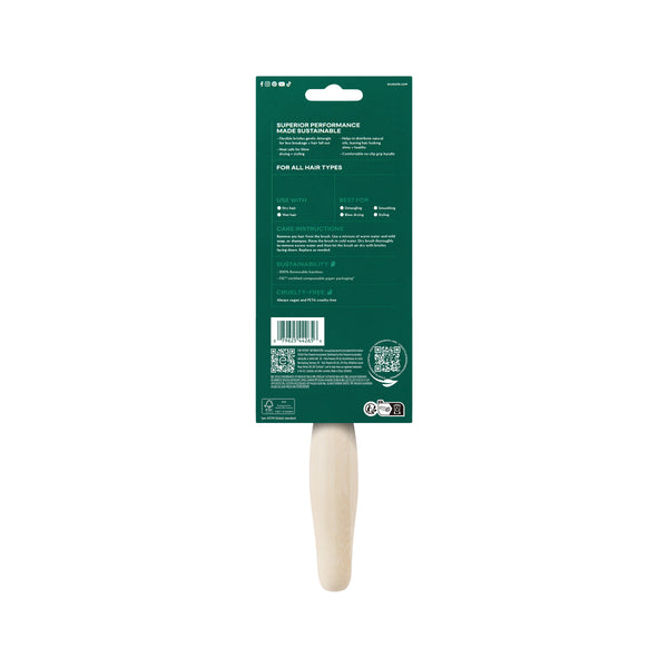 Shine Activating Detangler hair brush in retail box with visible handle end