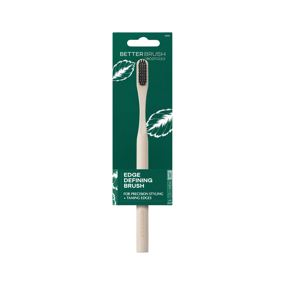 Edge defining brush with light bamboo handle and dark bristles, front view