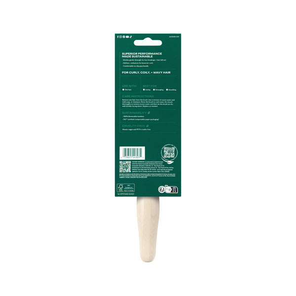 Green and white retail packaging card for a hair detangling brush
