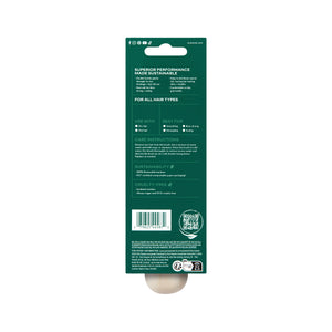Mini detangler brush package with green backer card and barcode