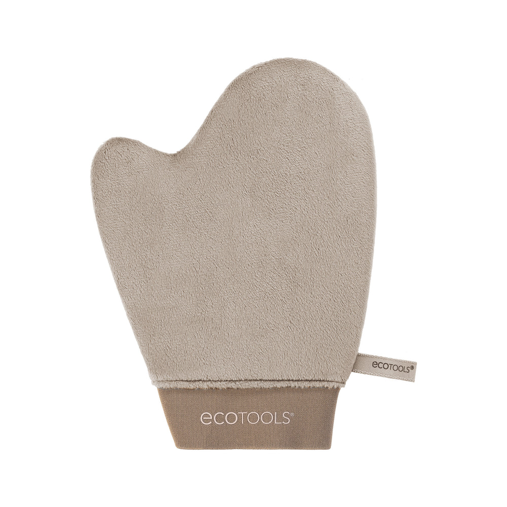 Beige full-body tanning mitt with terry cloth texture and thumb opening