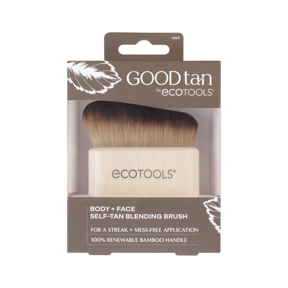 Self-tan blending brush with angled dark bristles and light bamboo handle, ECOTOOLS logo