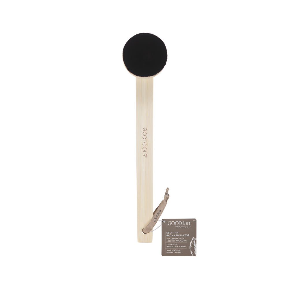 Self-tan back applicator with round black brush head and light wood handle
