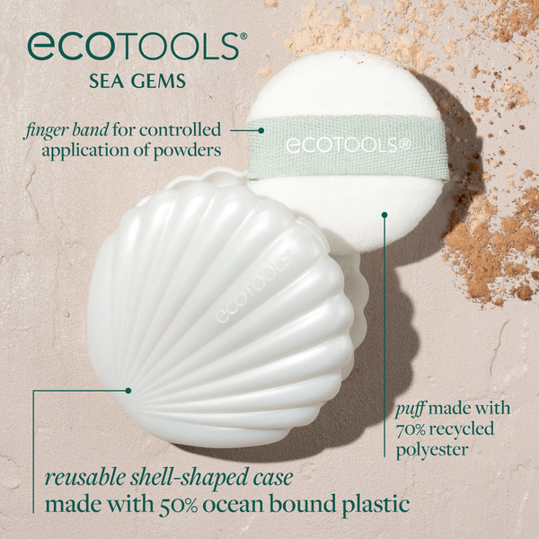 White shell-shaped case with mint-banded puff and round mirror, with net storage pouch
