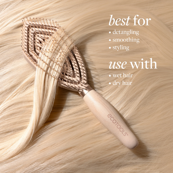 Fine hair detangler brush on blonde hair, showing pin rows on the bristle pad