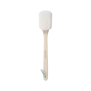 Loofah brush with white oval scrub head and natural wood handle