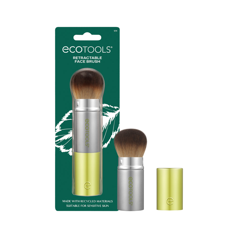 Retractable face brush with silver handle, brown bristles, and lime cap