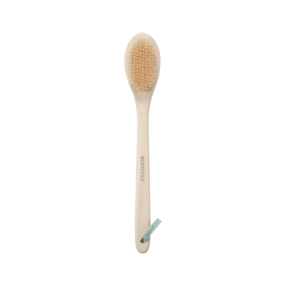 Bristle bath brush with oval head on a light bamboo handle, ecotools logo on handle.