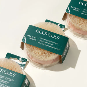 Assorted ECOTOOLS dry body brush packages showing round bristle heads