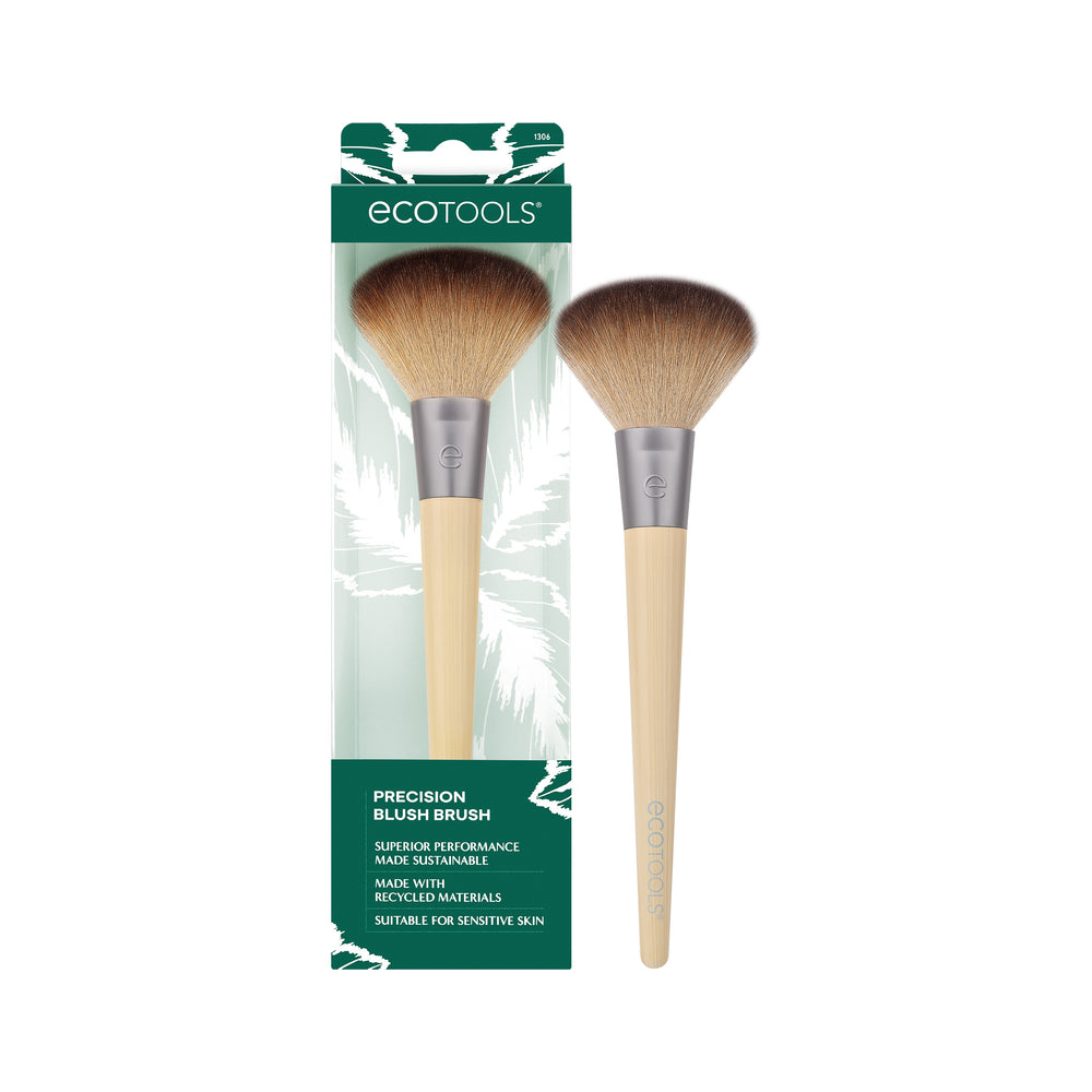 Blush makeup brush with dark tapered bristles and light bamboo handle