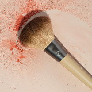 Blush brush with dense, angled bristles and black ferrule