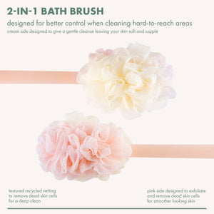 2-in-1 bath brush with cream and pink loofah puff heads on long handle