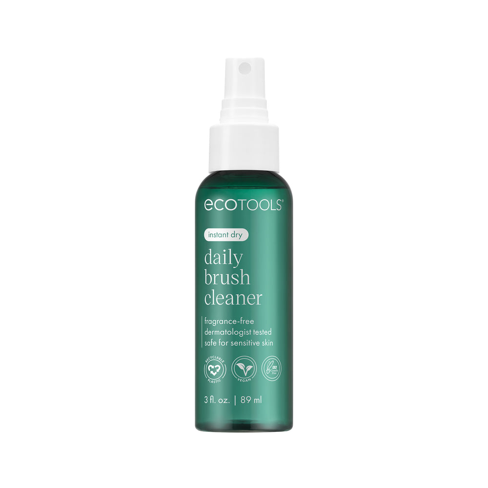 Brush cleaner bottle with white mist sprayer and dark green bottle, front view.