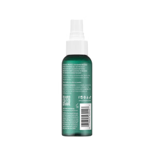 Green brush cleaner bottle with white mist nozzle, shown from the back.