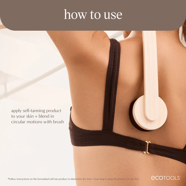 Self-tan back applicator with dark sponge pad, used on a back