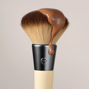 Blending face brush head with dense brown bristles and silver ferrule on beige handle