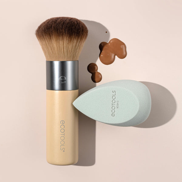 Face brush with bamboo handle and mint teardrop blending sponge