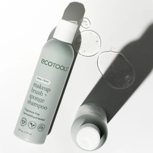 Makeup brush + sponge shampoo bottles with two gray sponge pieces