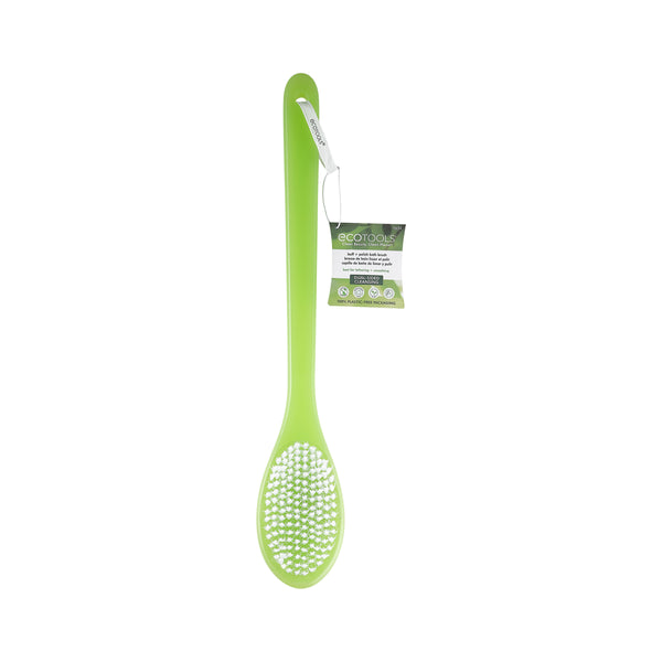 Green bath brush with white bristle-textured head and hanging product tag