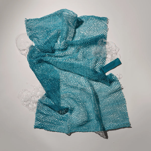 Teal exfoliating bath net with hanging loop and woven scrub mesh texture