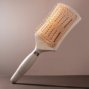 Smoothing detangler hair brush with light wood handle and rectangular pin brush head
