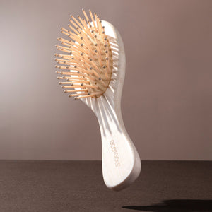 Mini detangler hair brush with bamboo handle and oval pin brush head